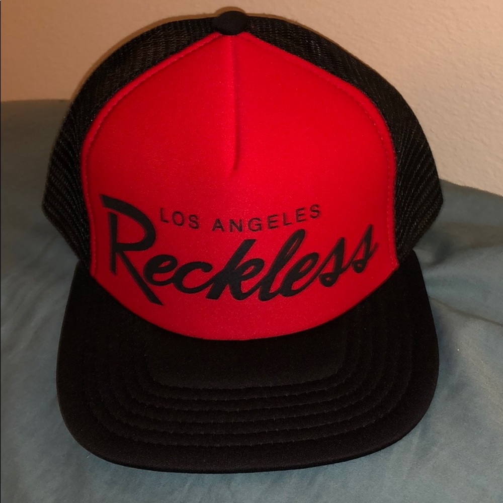 Young and Reckless trucker hat